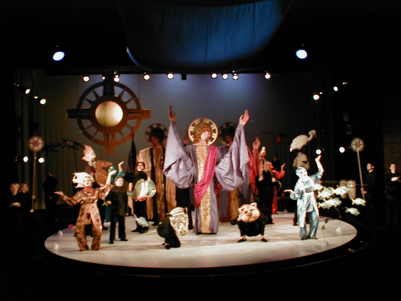 entire cast with puppets in creation of the world